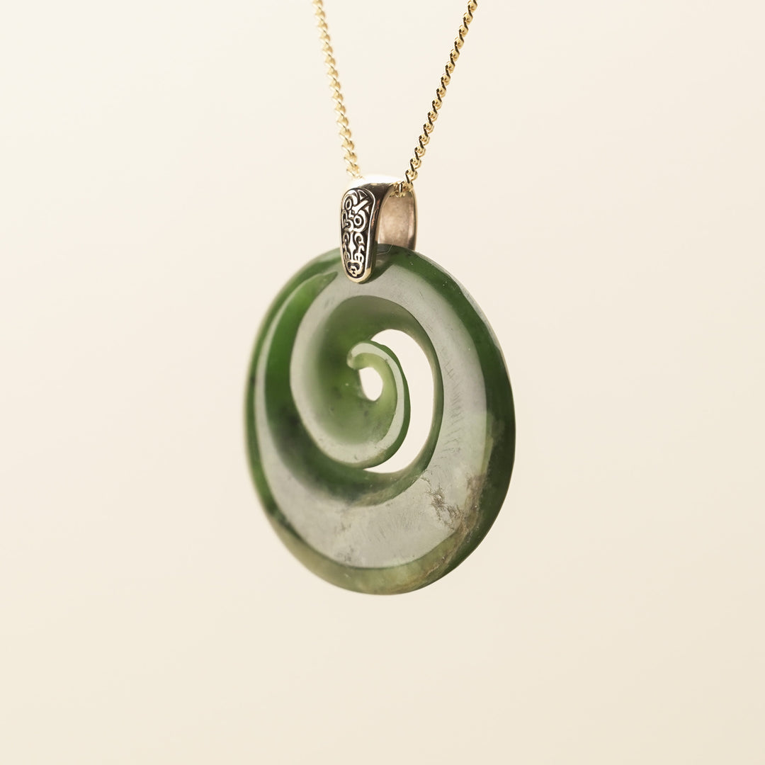 Flower Pounamu Porowhita Koru Pendant with Tiki Bail