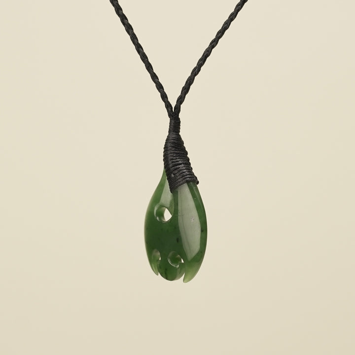 Hei Matau Medium Kawakawa Greenstone Black Binding