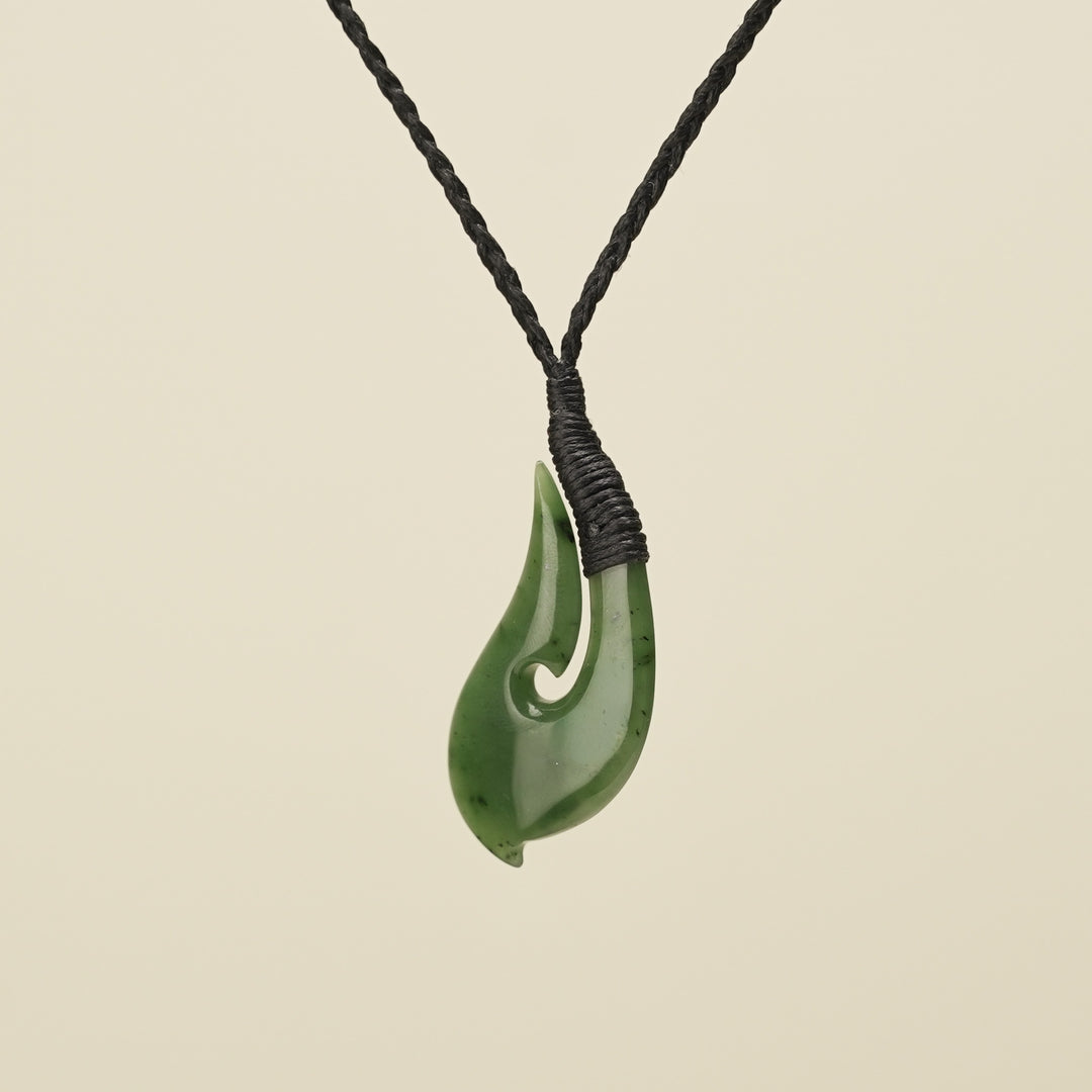 Hei Matau Medium Kawakawa Greenstone Black Binding