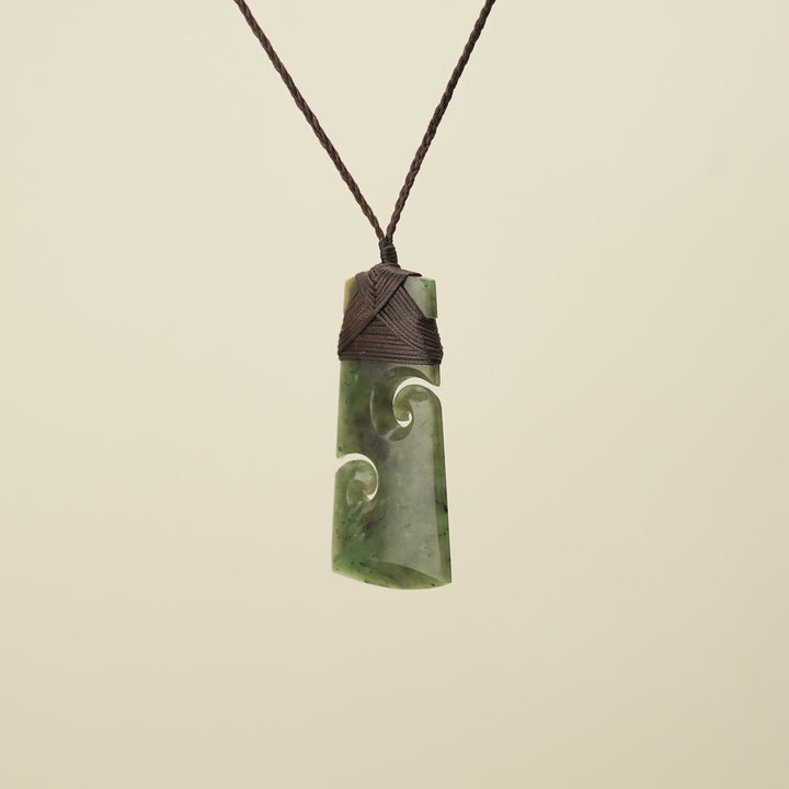 Toki with Koru Raukaraka Pounamu Large, Brown Binding