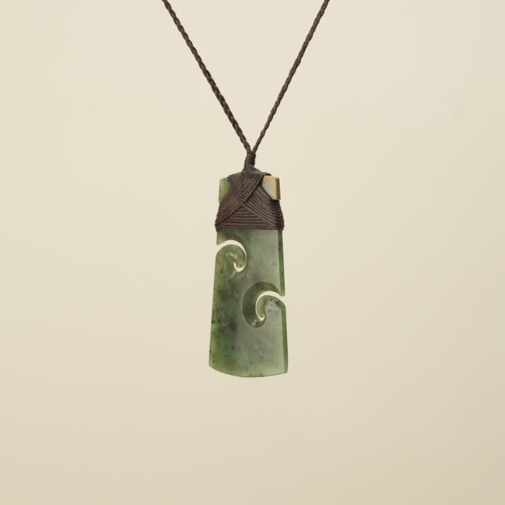 Toki with Koru Raukaraka Pounamu Large, Brown Binding