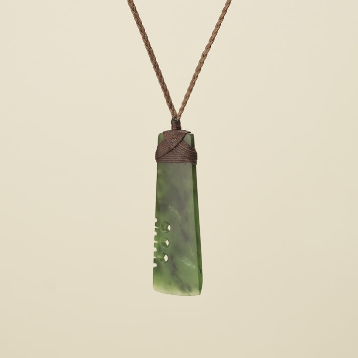 Notched Toki Kahurangi Medium Pounamu Pendant Brown Binding
