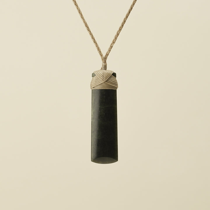 Toki Hapopo Pounamu Medium Pendant Tan Binding