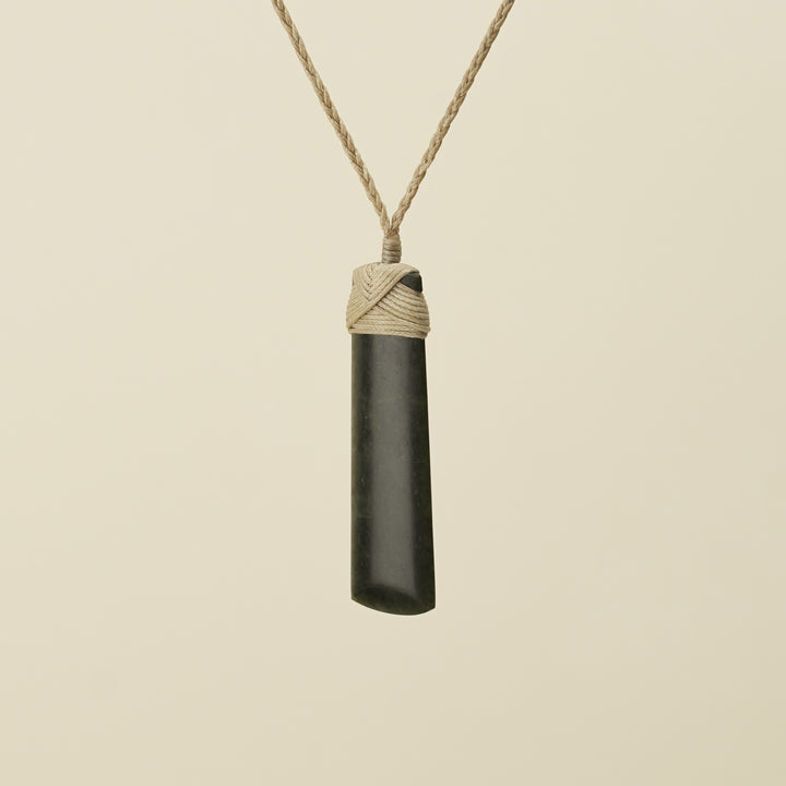 Toki Hapopo Pounamu Medium Pendant Tan Binding