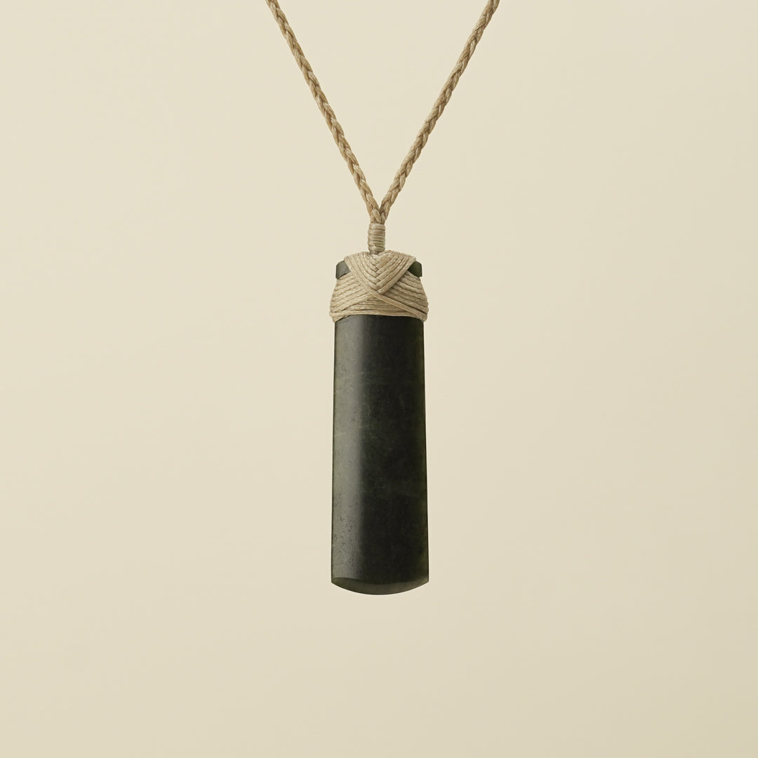 Toki Hapopo Pounamu Medium Pendant Tan Binding