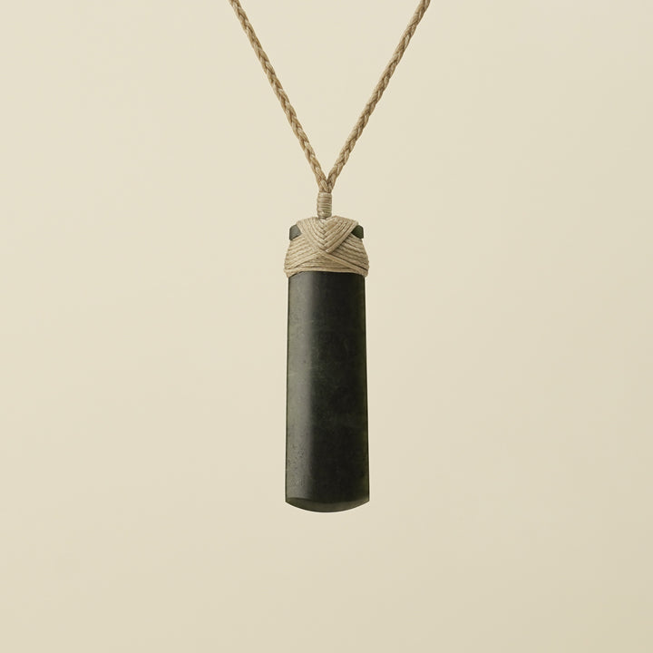 Toki Hapopo Pounamu Medium Pendant Tan Binding