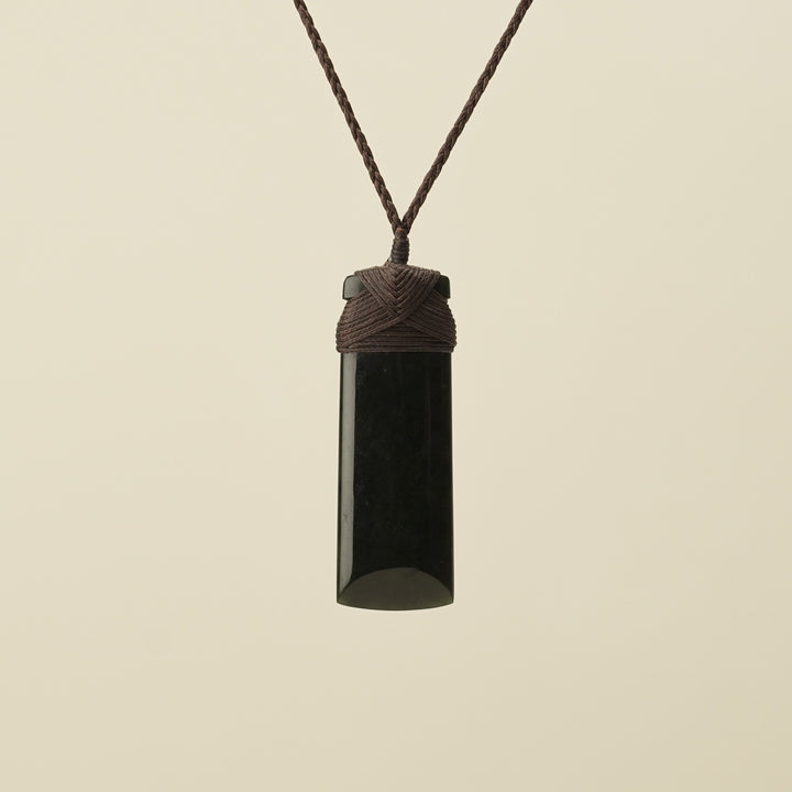 Medium Large Kawakawa Toki Pounamu Pendant Brown Binding