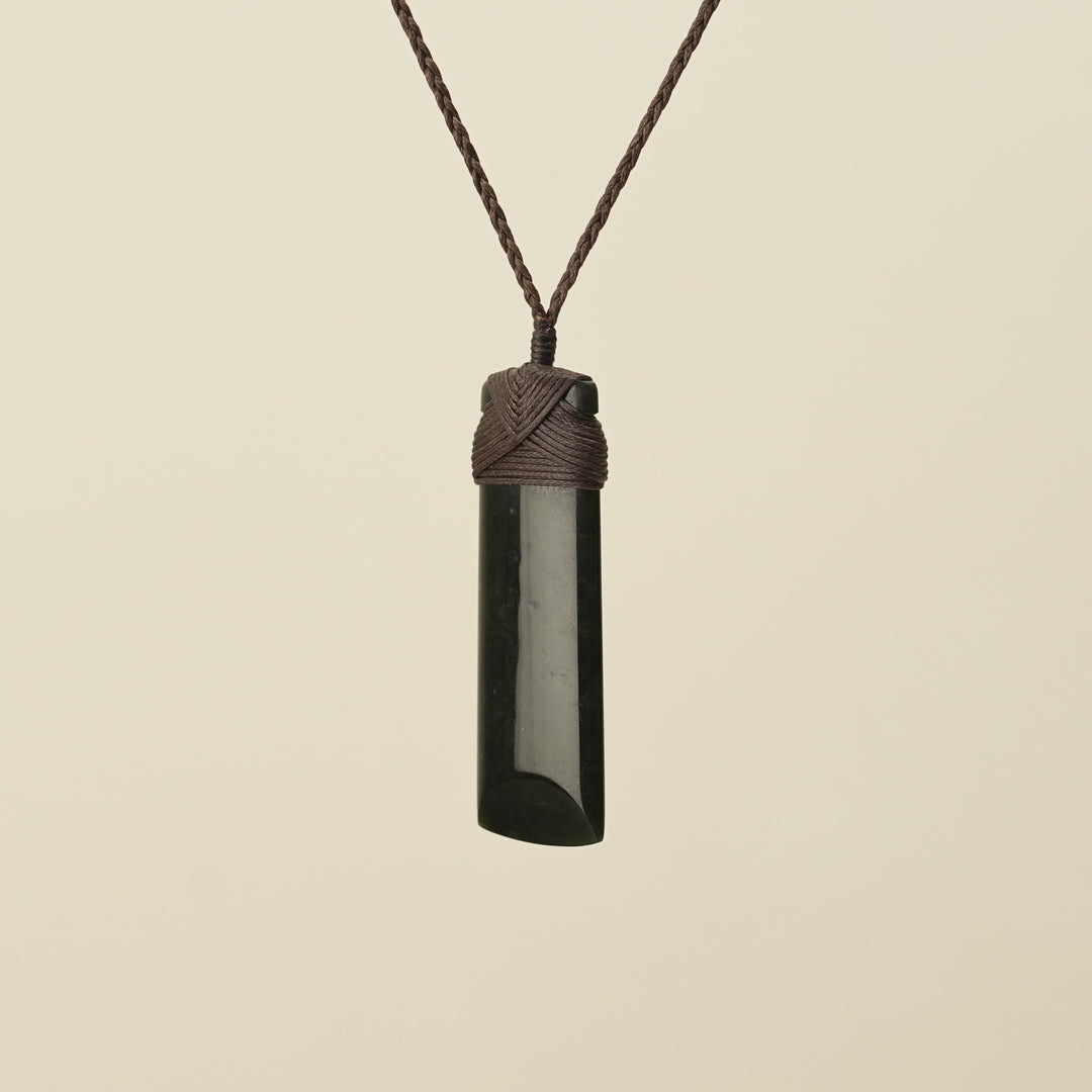 Medium Large Kawakawa Toki Pounamu Pendant Brown Binding