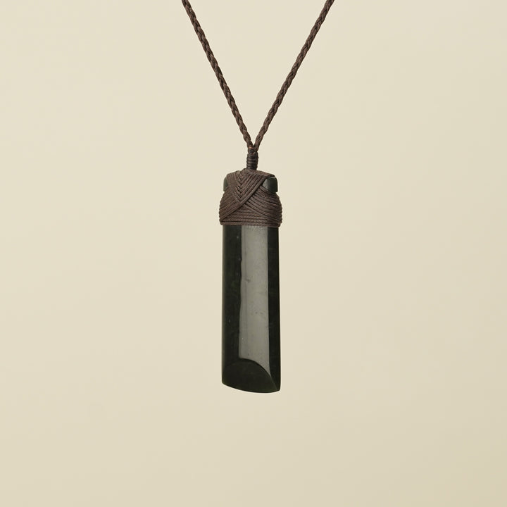 Medium Large Kawakawa Toki Pounamu Pendant Brown Binding