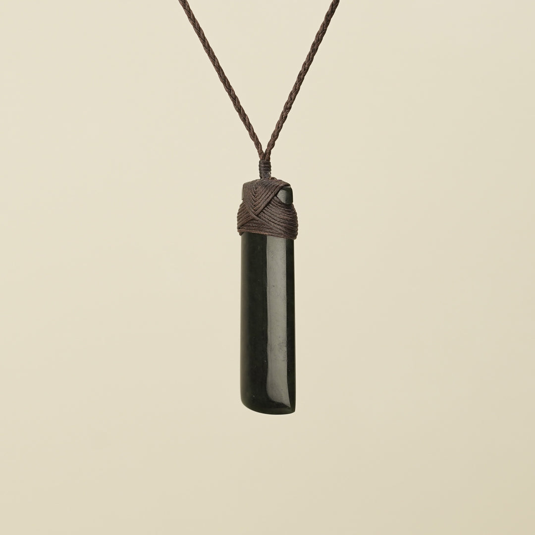 Medium Large Kawakawa Toki Pounamu Pendant Brown Binding