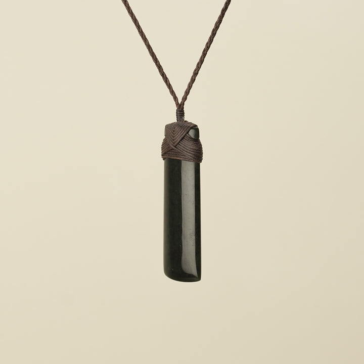 Medium Large Kawakawa Toki Pounamu Pendant Brown Binding