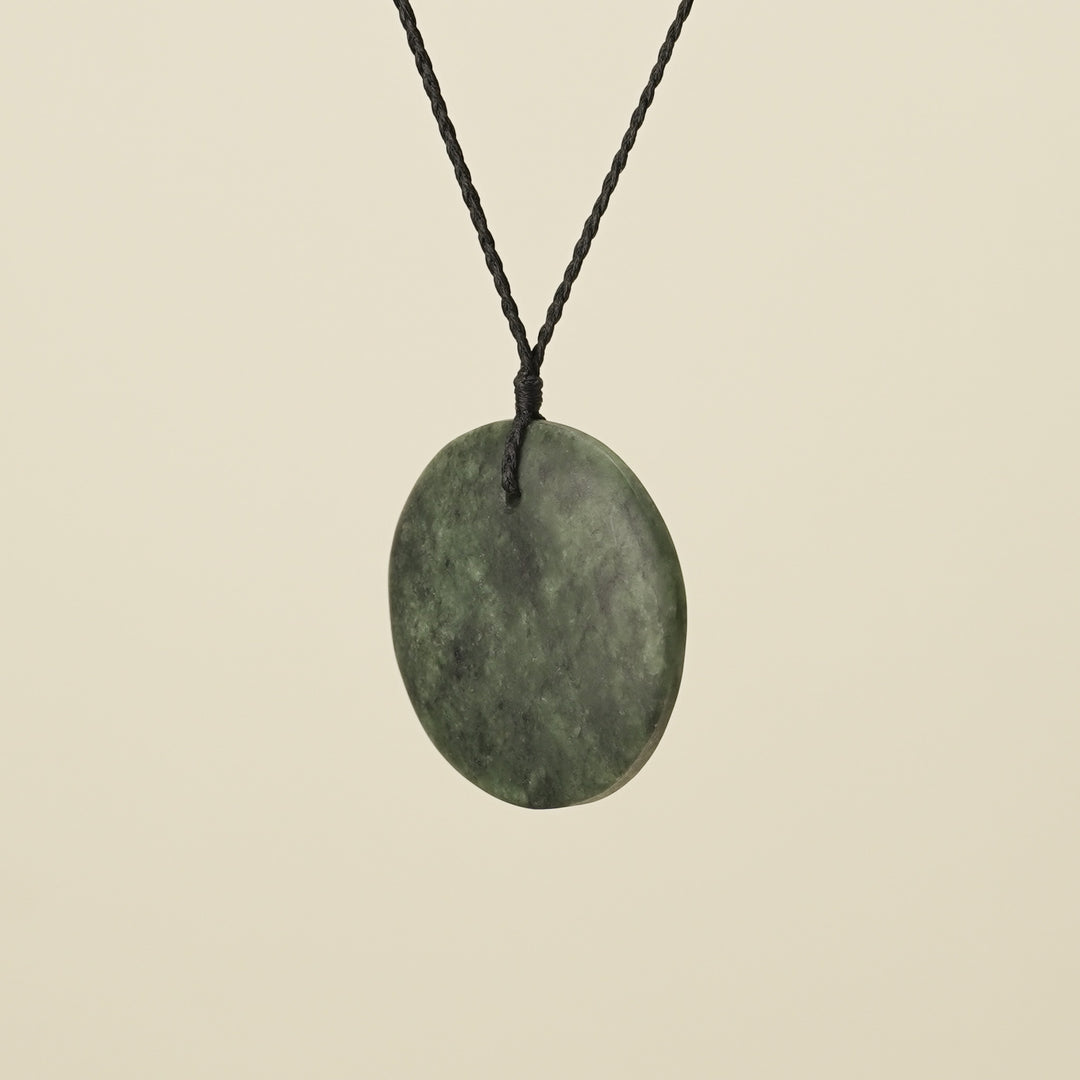 Koru Kawakawa Pounamu Pendant, Black Binding