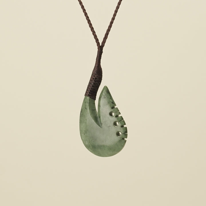 Notched Hei Matau Inanga Medium Pendant, Brown Binding