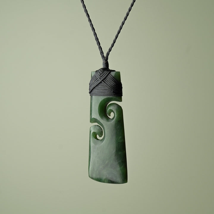 Large Pounamu Toki with Koru, Black Binding
