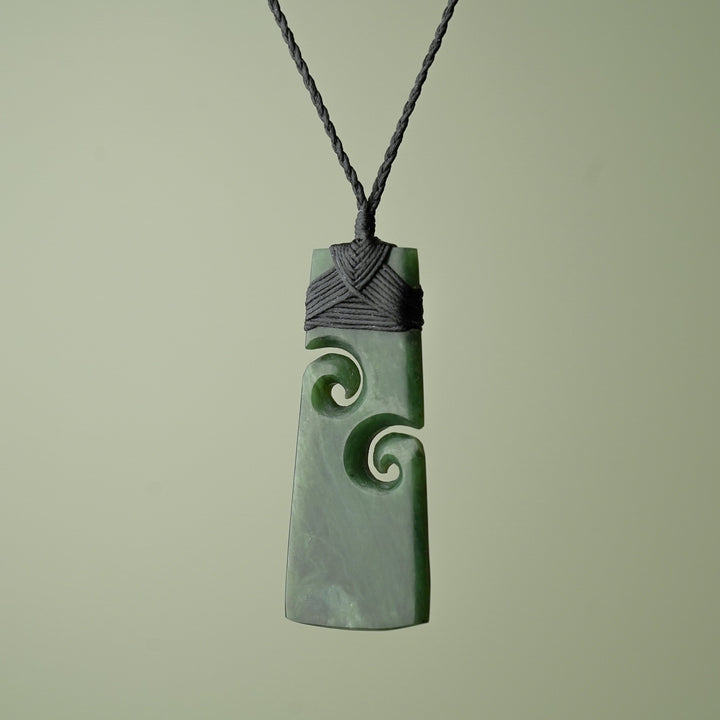 Large Pounamu Toki with Koru, Black Binding
