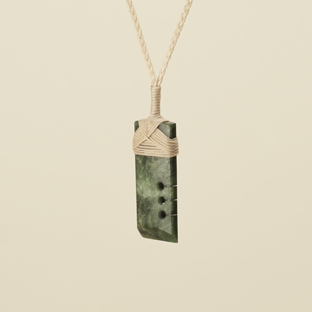 Notched Toki Hapopo Small Pounamu Pendant Tan Binding