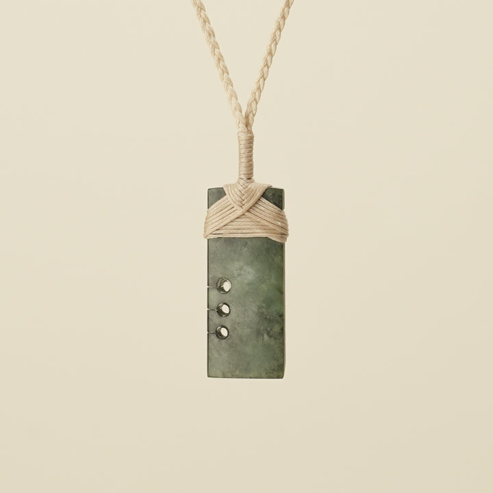 Notched Toki Hapopo Small Pounamu Pendant Tan Binding