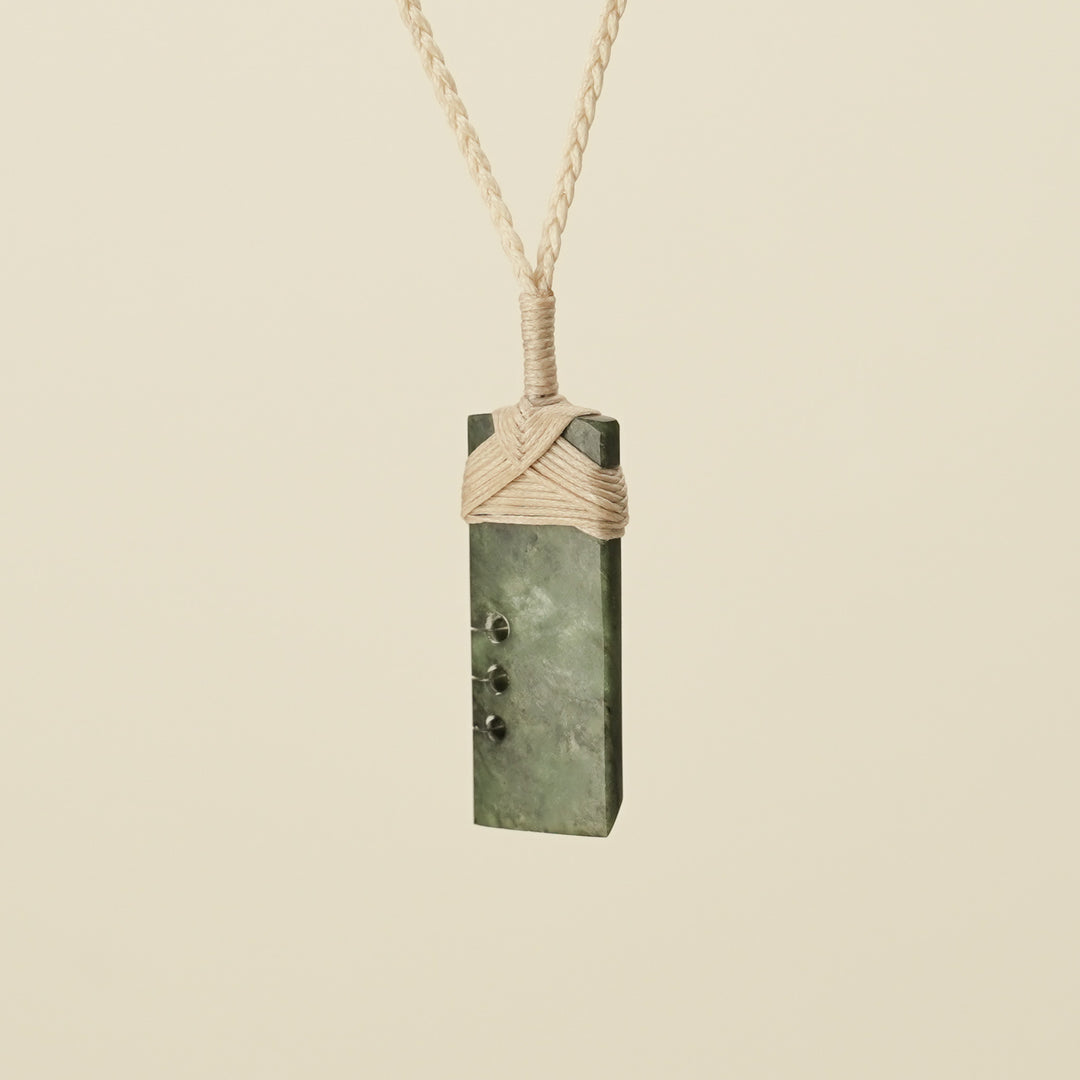 Notched Toki Hapopo Small Pounamu Pendant Tan Binding