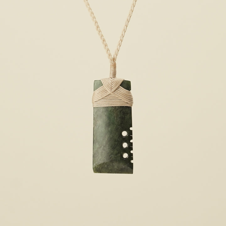 Notched Toki Hapopo Medium Pounamu Pendant Tan Binding