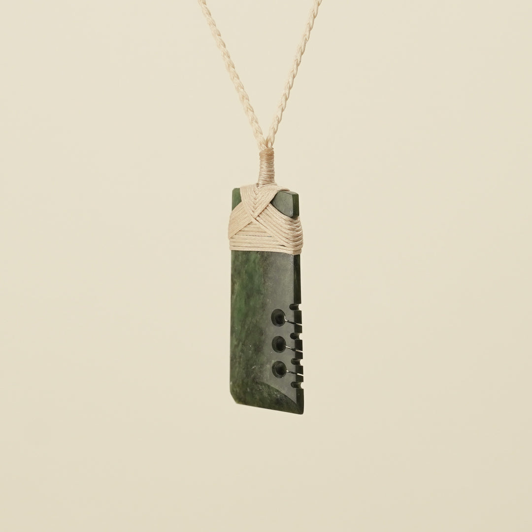 Notched Toki Hapopo Medium Pounamu Pendant Tan Binding
