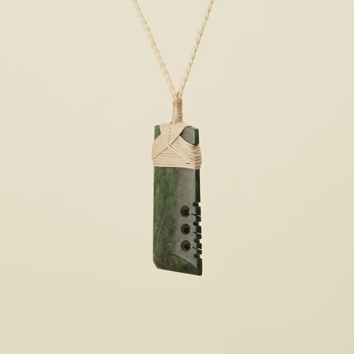 Notched Toki Hapopo Medium Pounamu Pendant Tan Binding