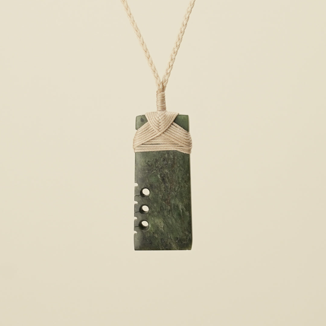Notched Toki Hapopo Medium Pounamu Pendant Tan Binding