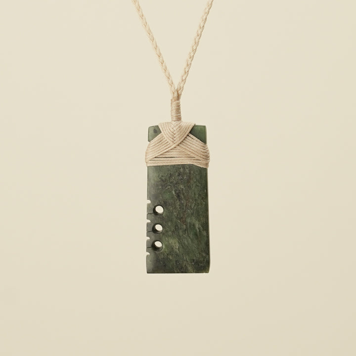 Notched Toki Hapopo Medium Pounamu Pendant Tan Binding