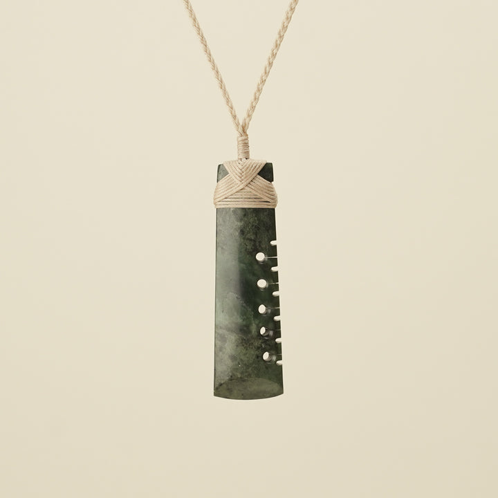 Notched Toki Hapopo Large Pounamu Pendant, Tan Binding
