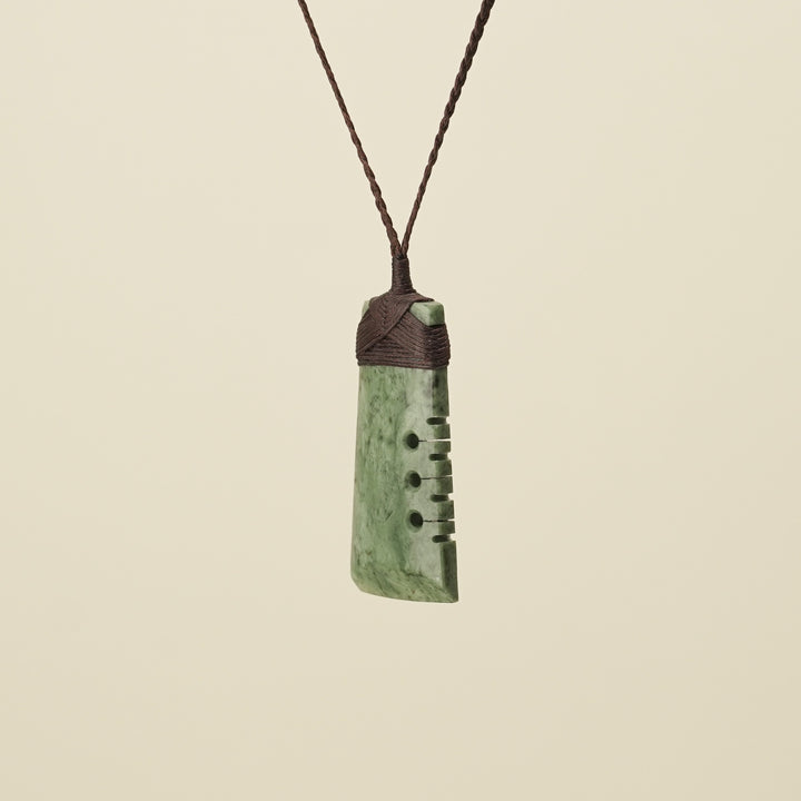 Notched Toki Inanga Medium Large Pounamu Pendant Brown Binding