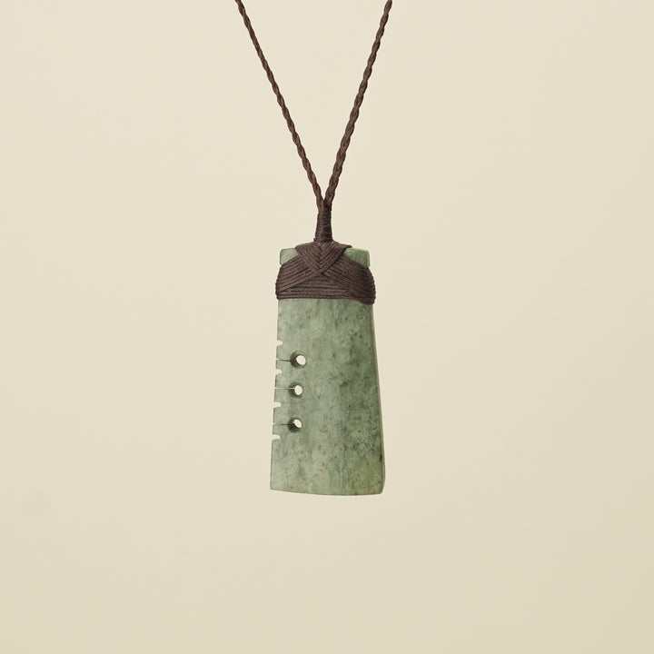 Notched Toki Inanga Medium Large Pounamu Pendant Brown Binding