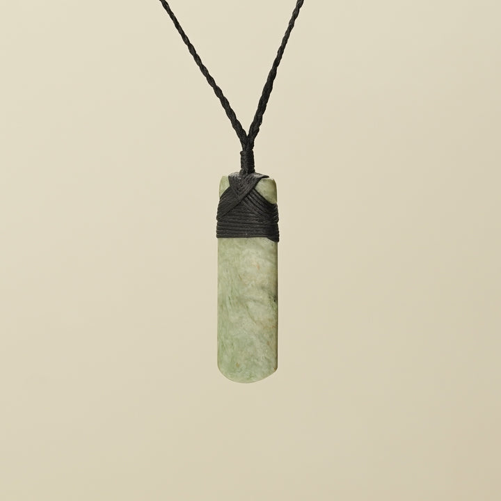 Medium Large Inanga Raukaraka Toki Pounamu Pendant Black Binding