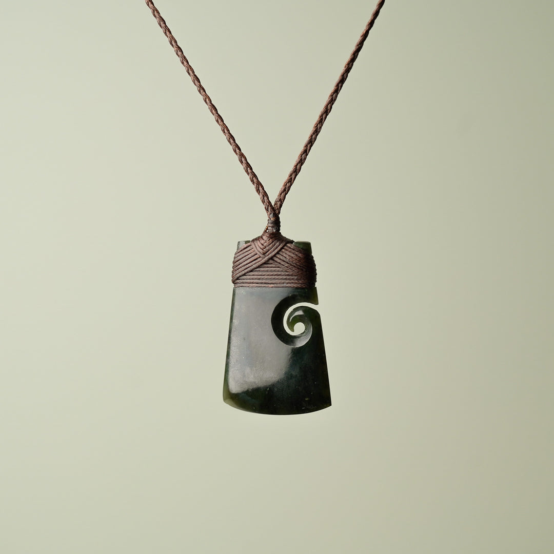 Medium Pounamu Toki with Koru, Brown Binding
