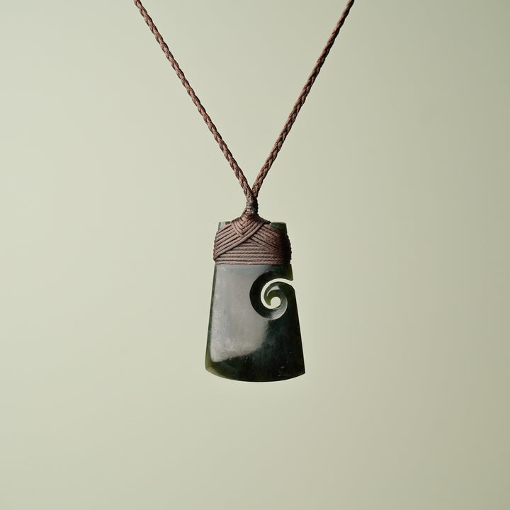 Medium Pounamu Toki with Koru, Brown Binding