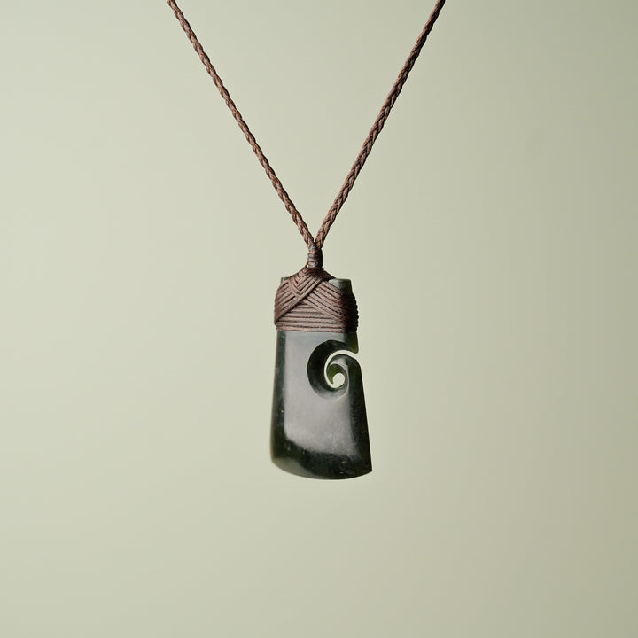 Medium Pounamu Toki with Koru, Brown Binding