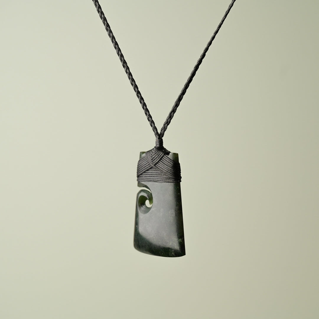 Medium Pounamu Toki with Koru, Black Binding