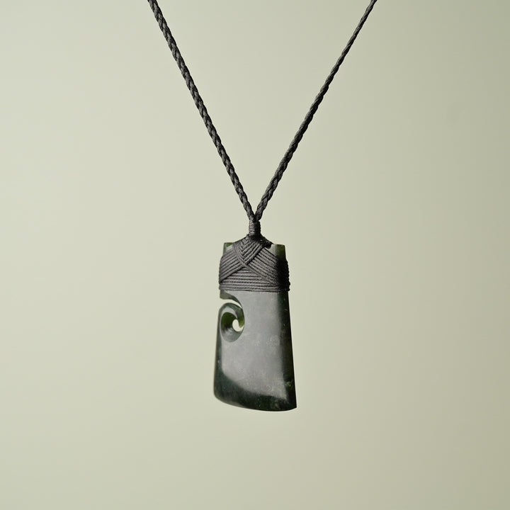 Medium Pounamu Toki with Koru, Black Binding