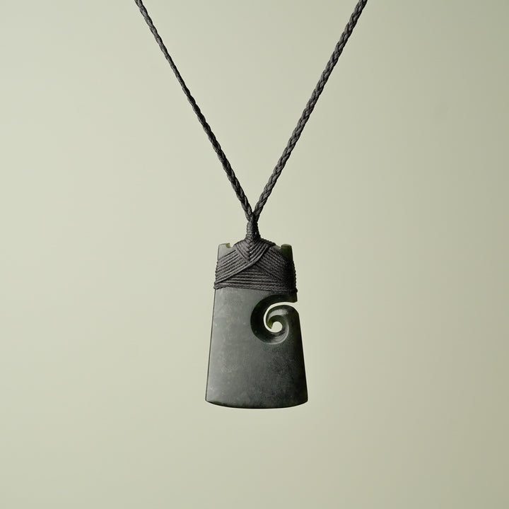 Medium Pounamu Toki with Koru, Black Binding