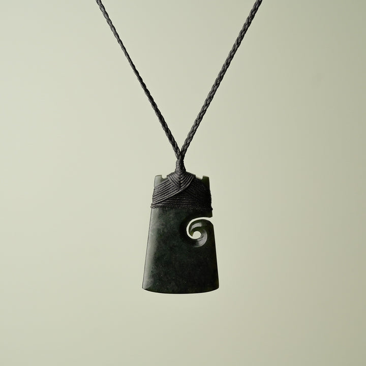 Medium Pounamu Toki with Koru, Black Binding