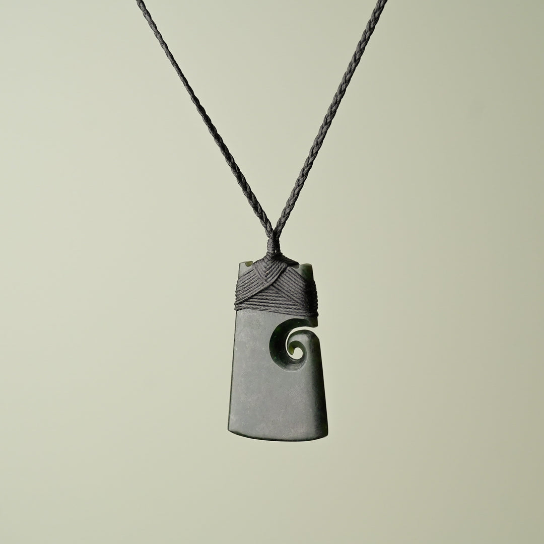 Medium Pounamu Toki with Koru, Black Binding