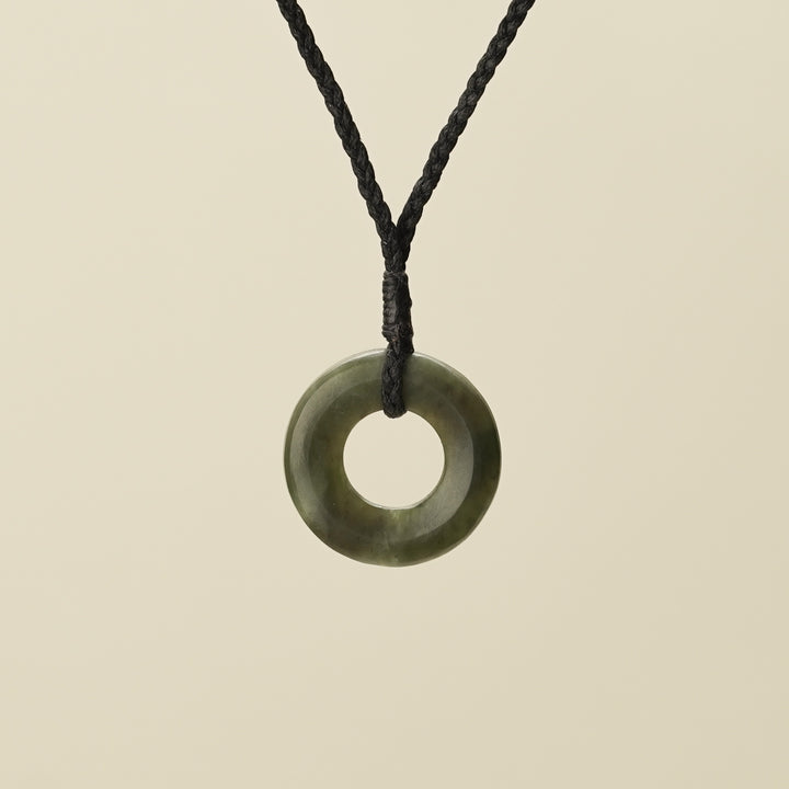 Porowhita Circle of Life Kawakawa Pounamu Small, Black Binding