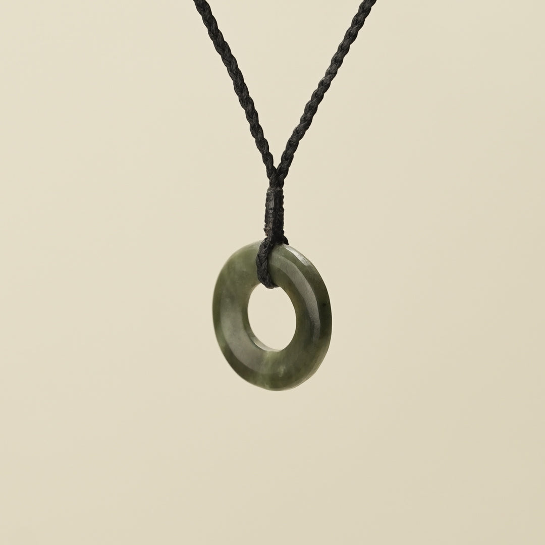 Porowhita Circle of Life Kawakawa Pounamu Small, Black Binding