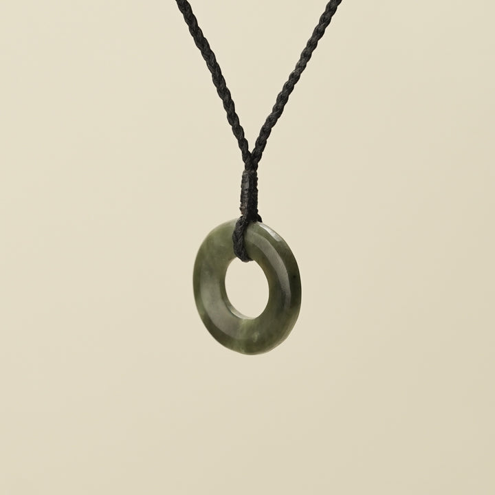 Porowhita Circle of Life Kawakawa Pounamu Small, Black Binding