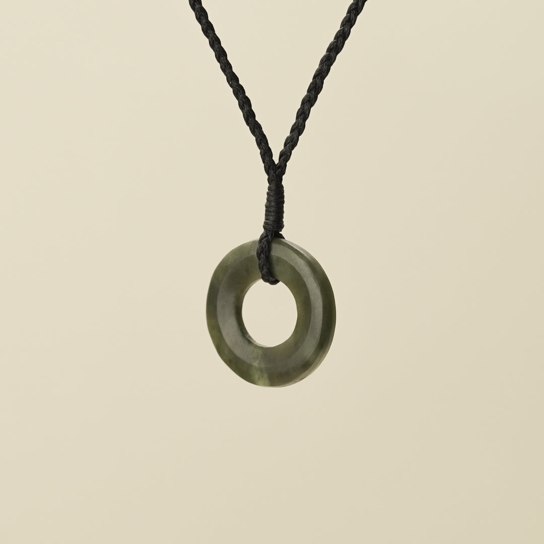Porowhita Circle of Life Kawakawa Pounamu Small, Black Binding