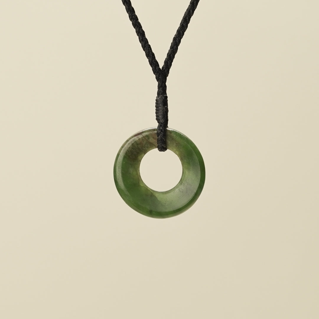 Porowhita Circle of Life Kawakawa Pounamu Small, Black Binding