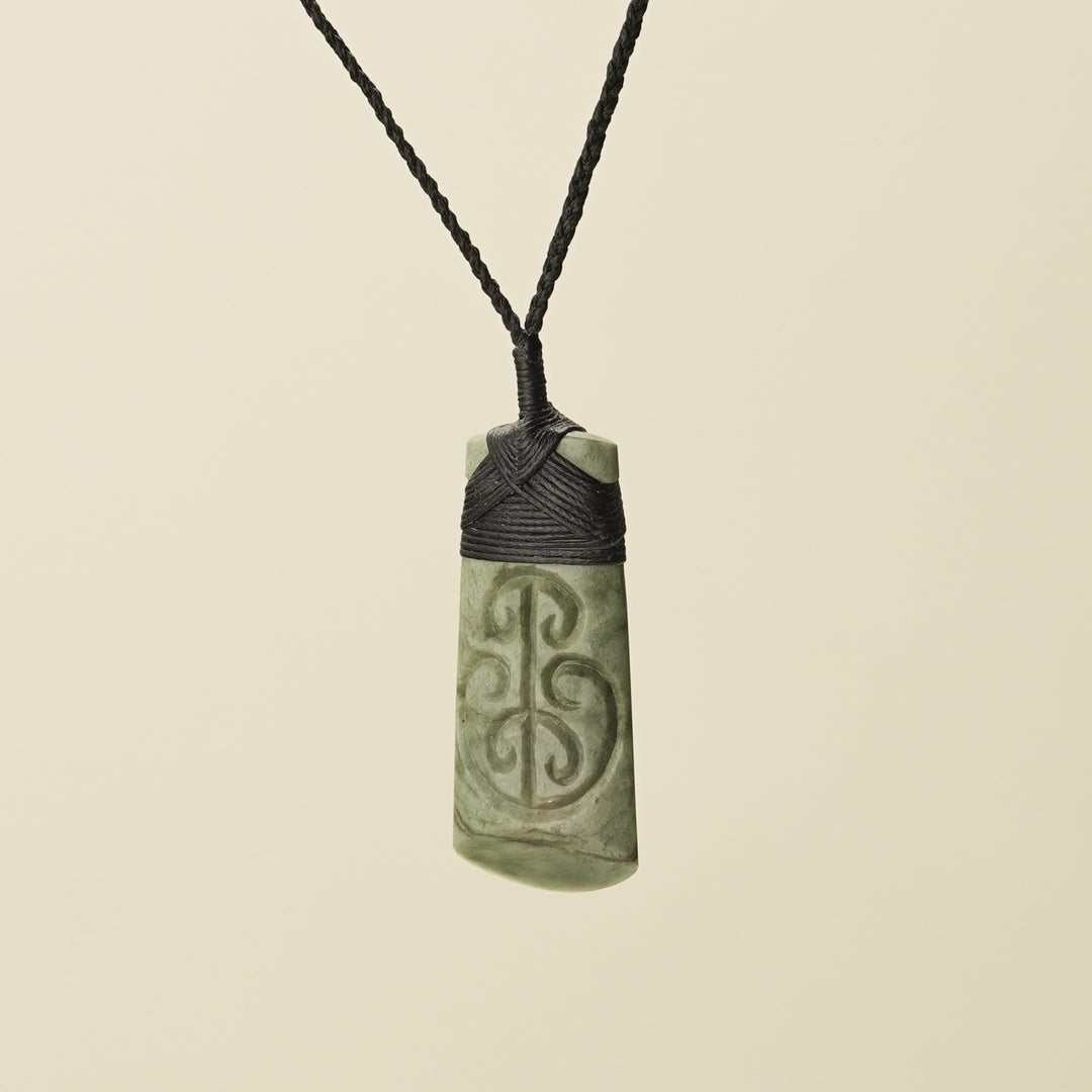 Toki Whakarei Koru Carved Small Pounamu Pendant