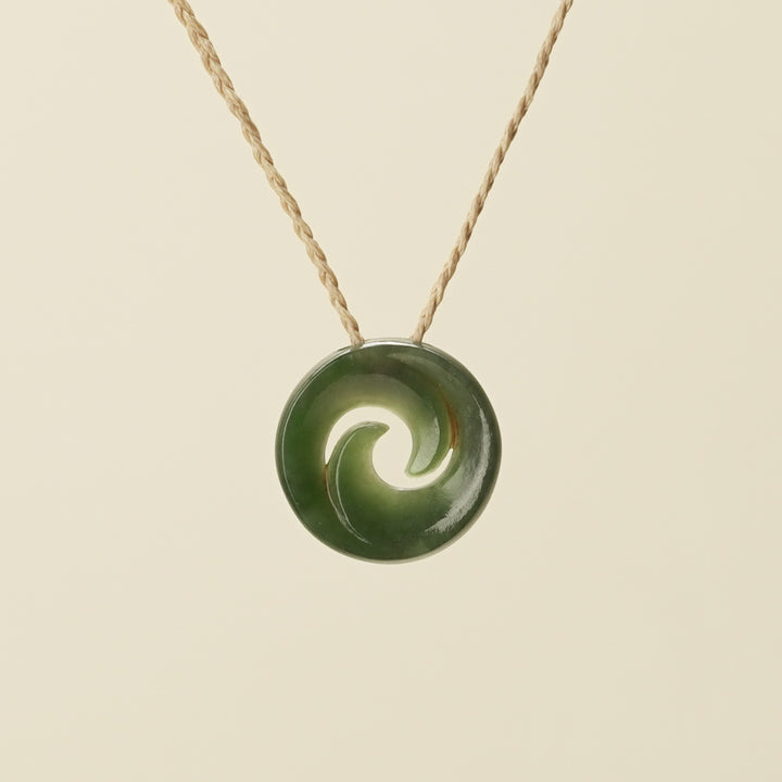 Koru Kawakawa Pounamu Pendant, Tan Binding