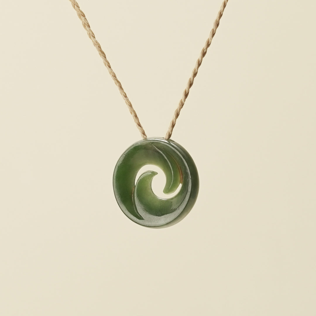 Koru Kawakawa Pounamu Pendant, Tan Binding