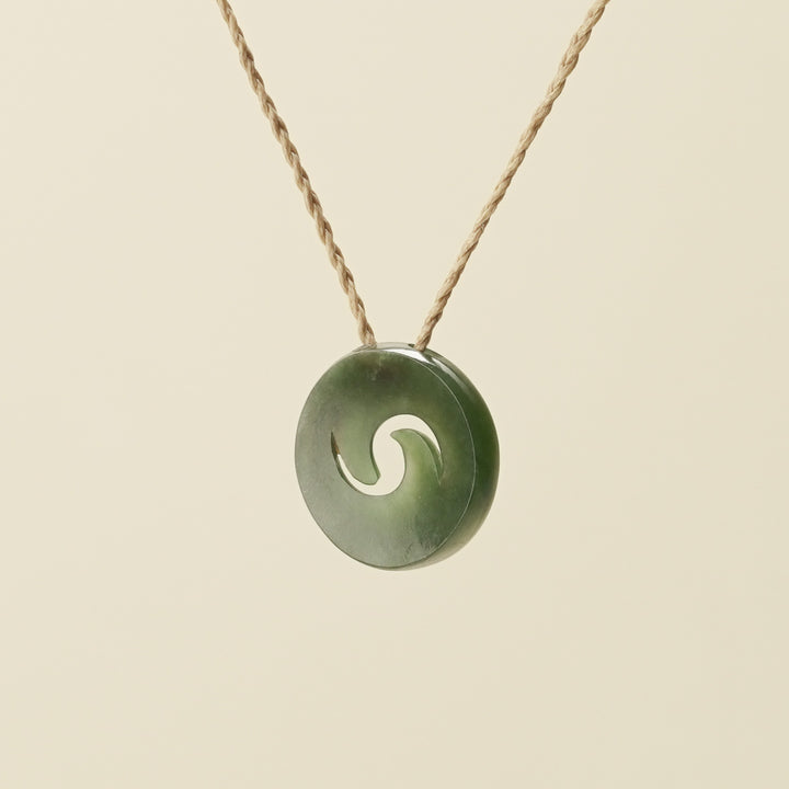 Koru Kawakawa Pounamu Pendant, Tan Binding