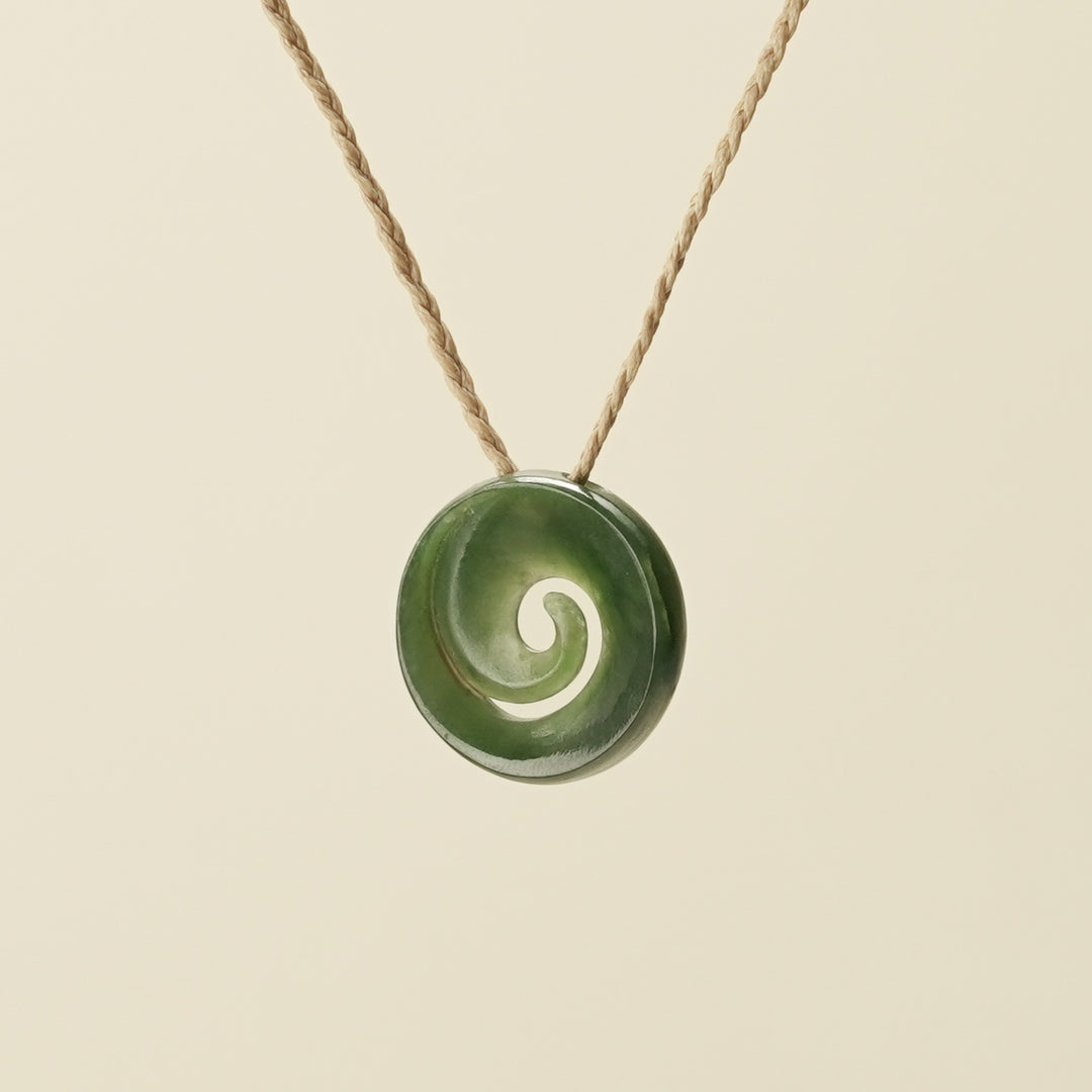 Koru Kawakawa Pounamu Pendant, Tan Binding