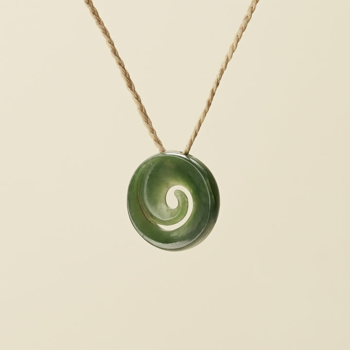 Koru Kawakawa Pounamu Pendant, Tan Binding